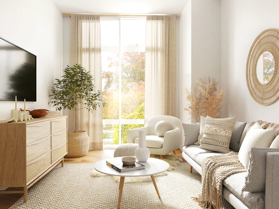 A tidy living room with sunlight across the floor