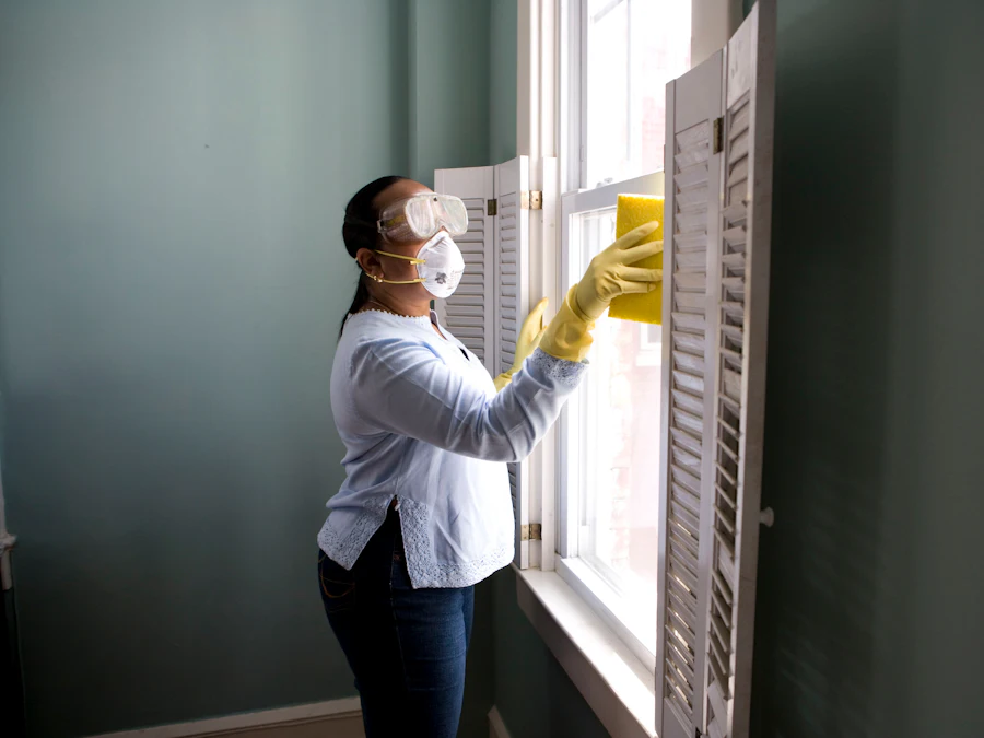 Interior window and frame being wiped down